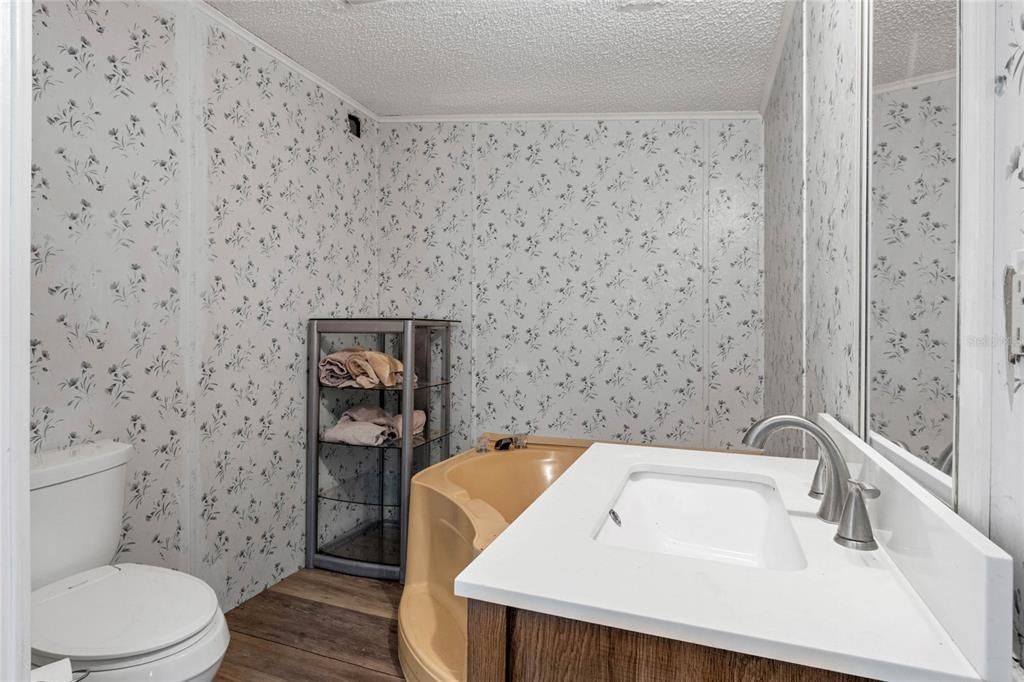 Master Bathroom features a garden tub