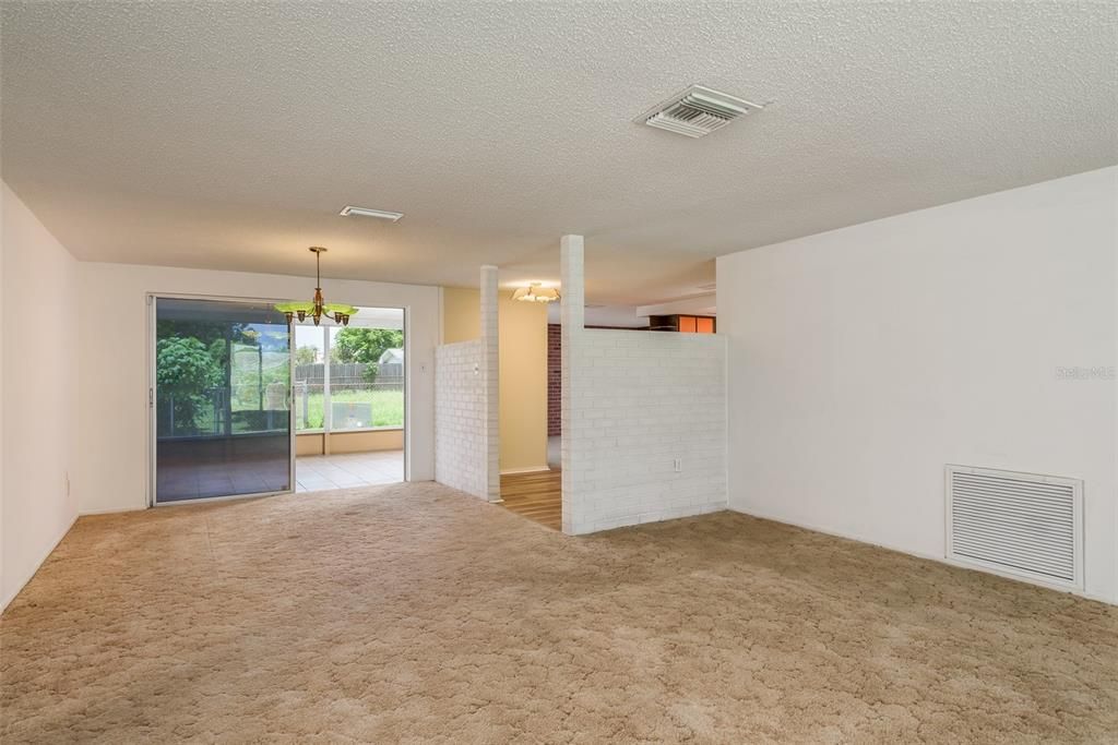 Living Room / Dining Room & sliders to back porch