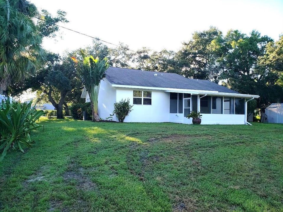 BACK YARD AND BACK OF HOUSE