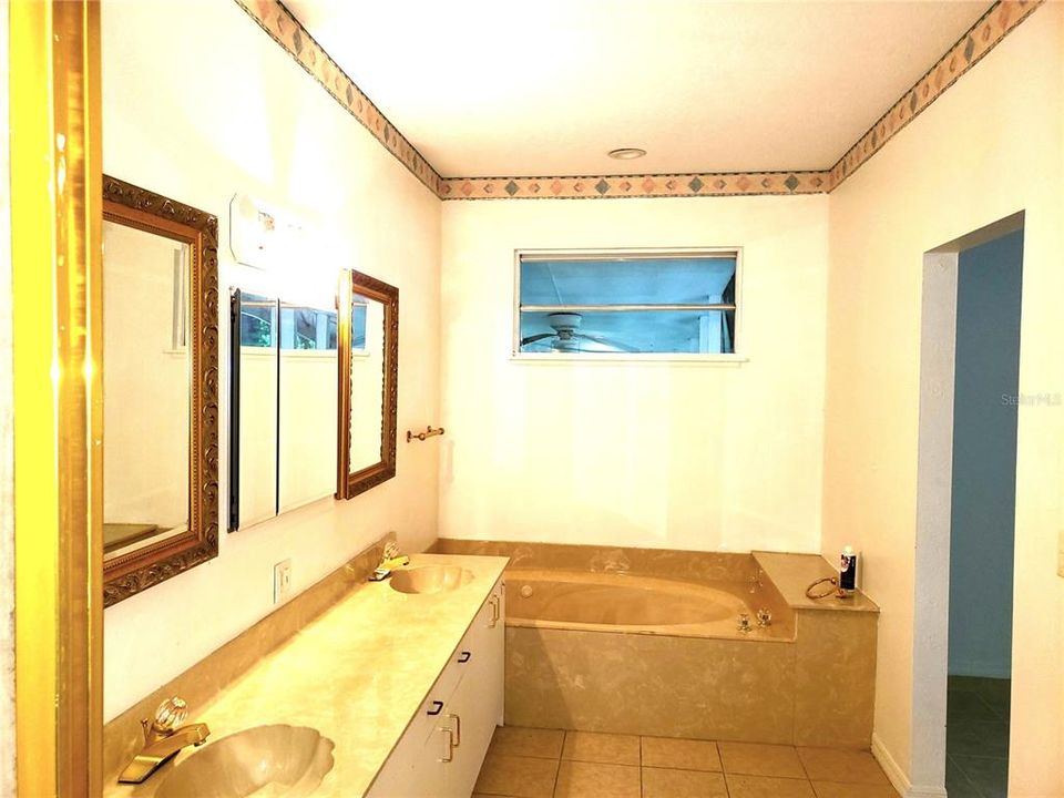 PRIMARY BATH WITH  DUO SINKS SHOWER AND GARDEN TUB