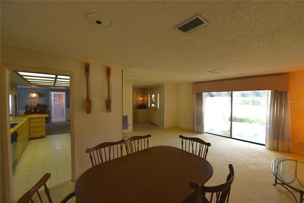 Dining room, kitchen, living room.