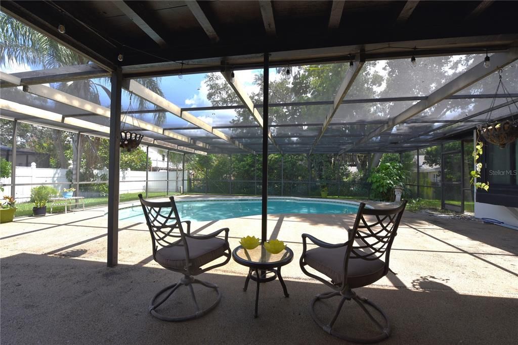 Covered patio and pool.