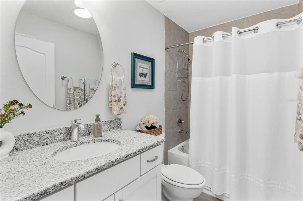 Bathroom Two with Tub/Shower Combo and custom tile