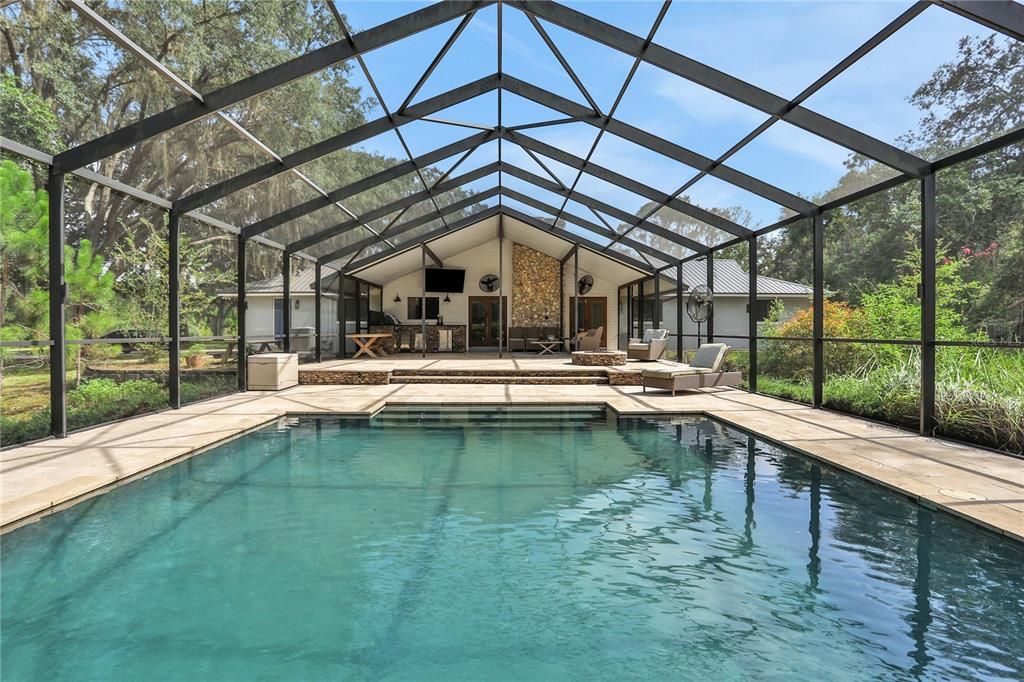 Jump into the deep end of this beautiful custom built pool on a hot Summer day!