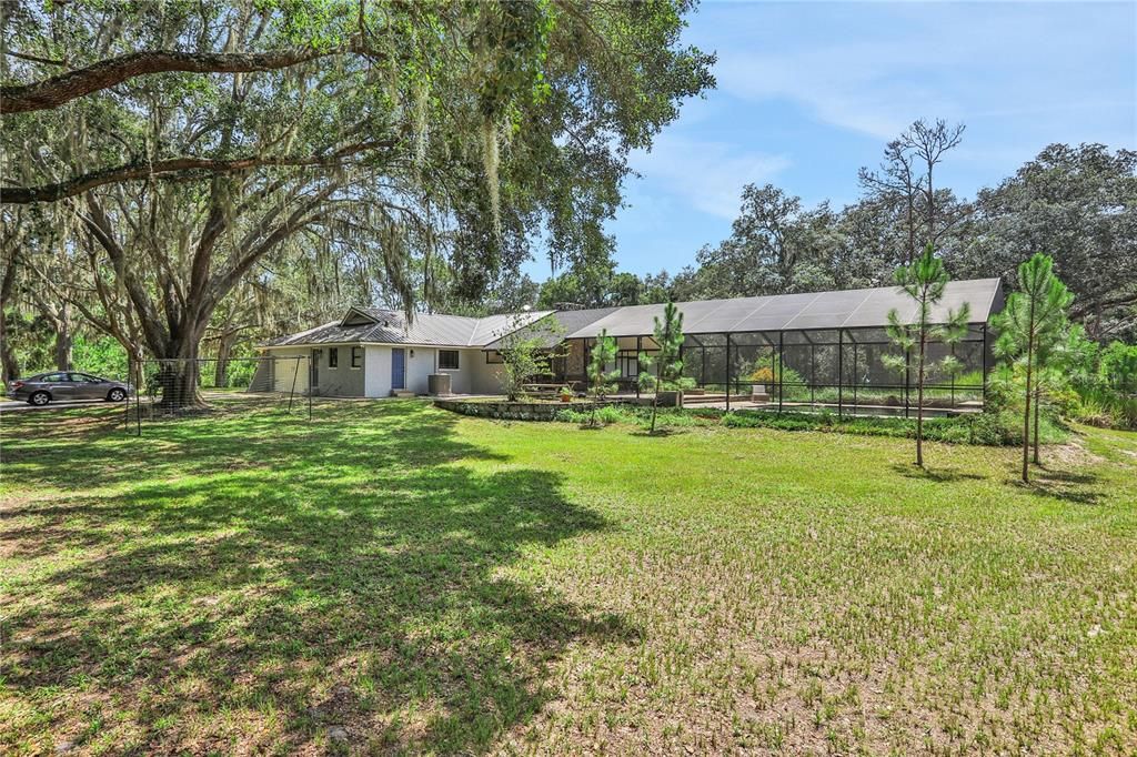 View of home and pool from Barn and Paddock