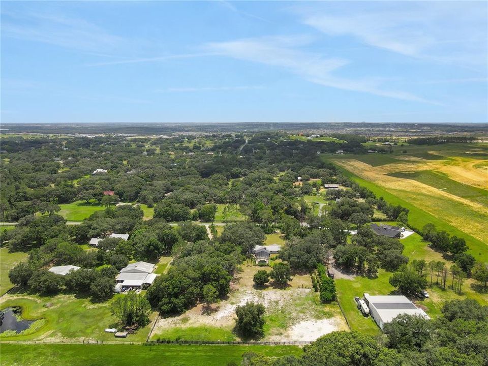 On 4.72 Acres, you'll find complete privacy, beautiful oaks, pine trees, bamboo and other lush vegetation surrounding the property