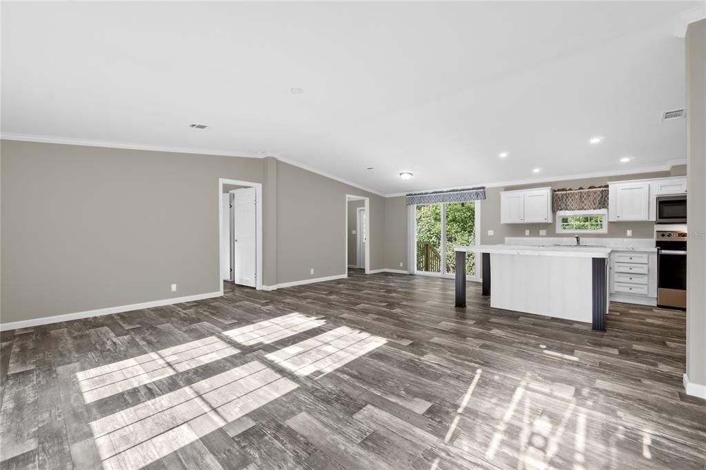 Living Room w/view of Primary Bedroom Entry