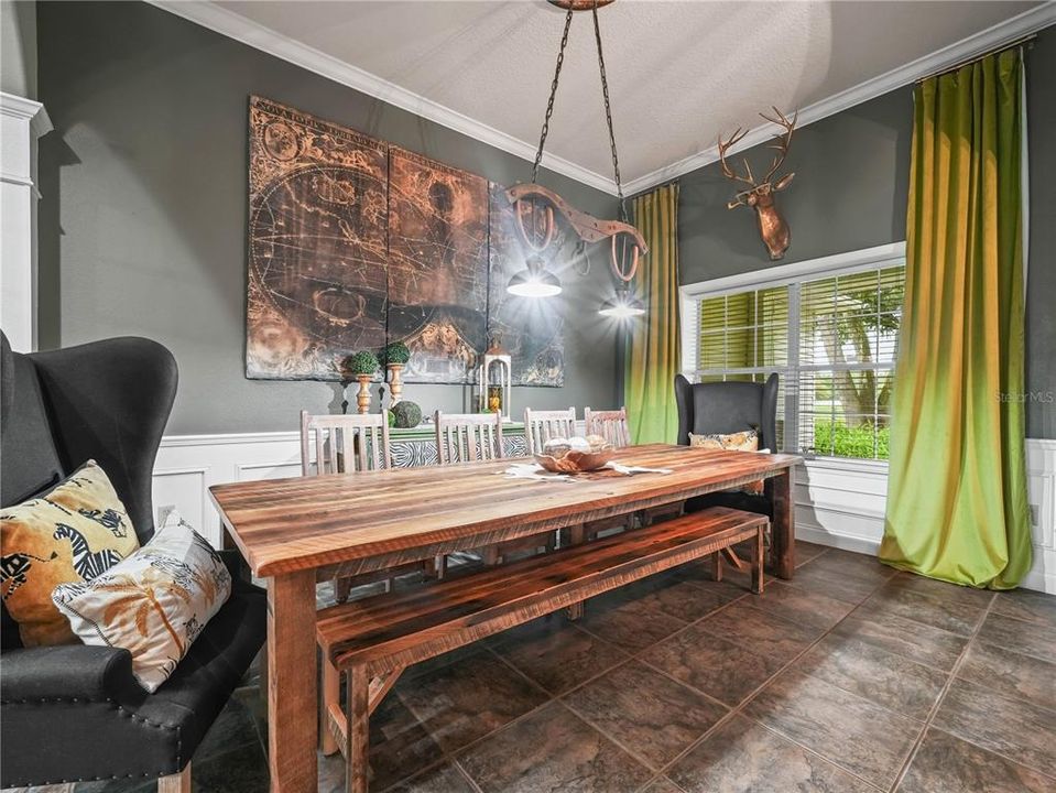 Formal Dining Room with soaring ceilings