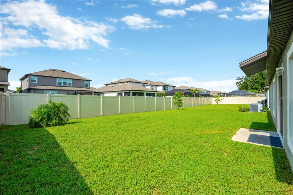 Small patio off the sliding doors in the back of this home.