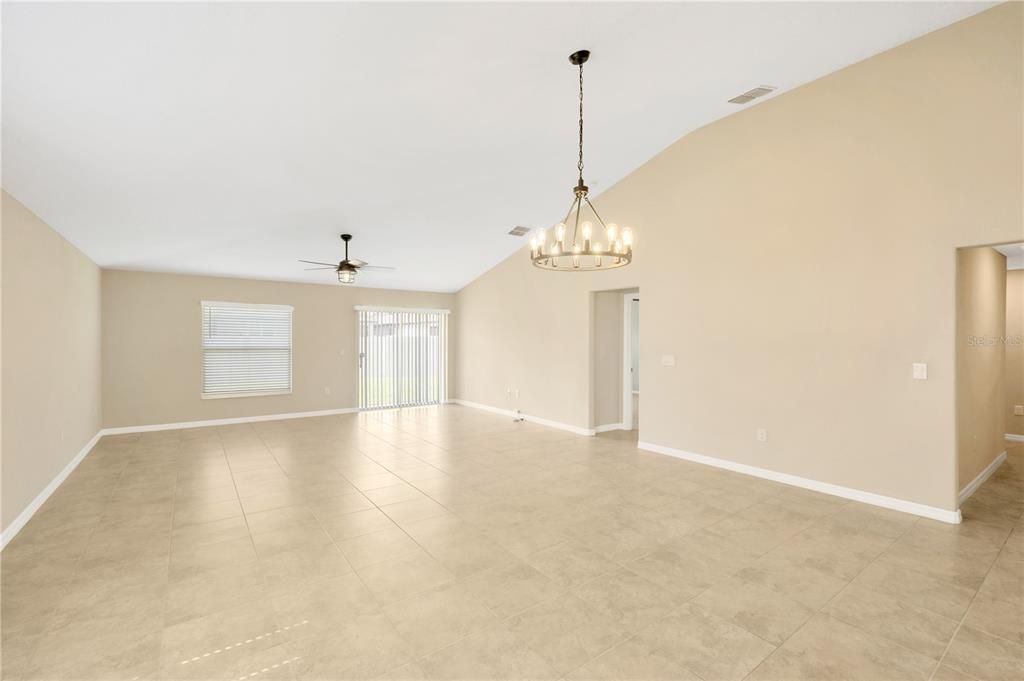 Separate doorways from family room lead to primary suite and secondary bedrooms.