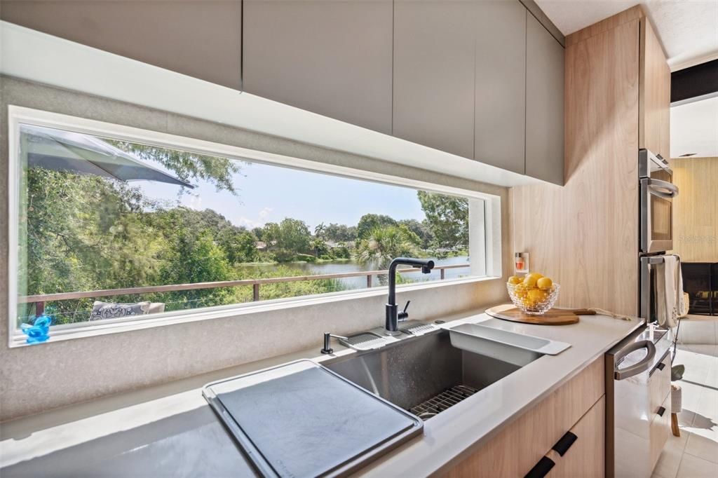 Stunning view from the kitchen's custom horizontal impact rated window