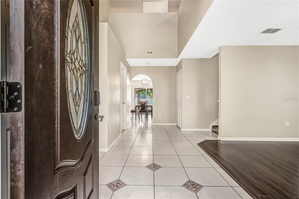 tile flooring that leads to the formal dining room