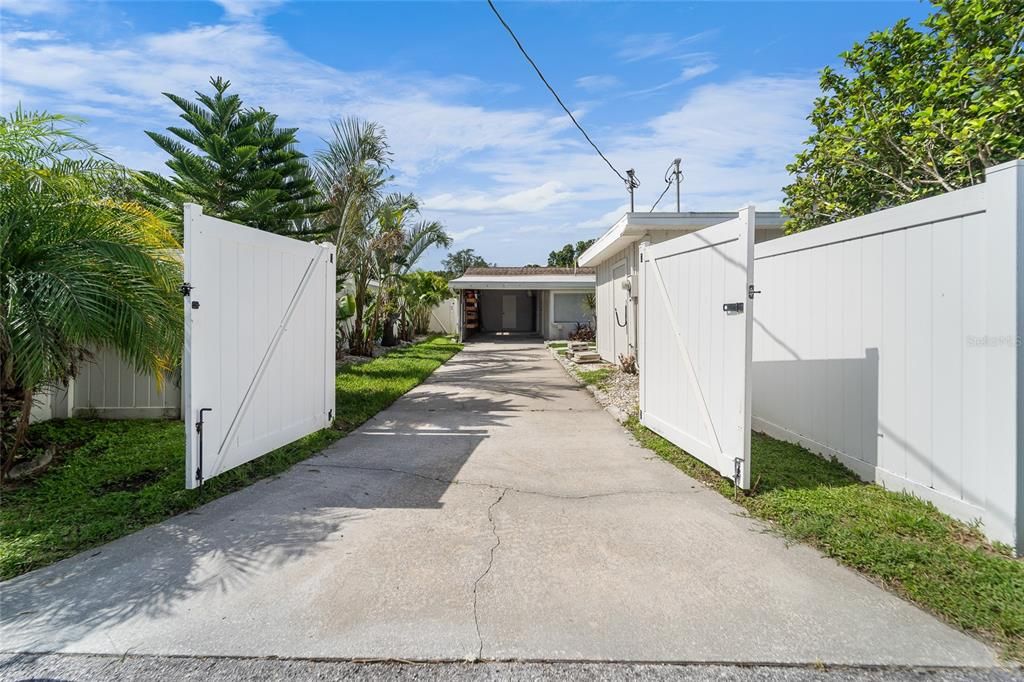 Gated Access to Drive and Carport from Paved Alleyway