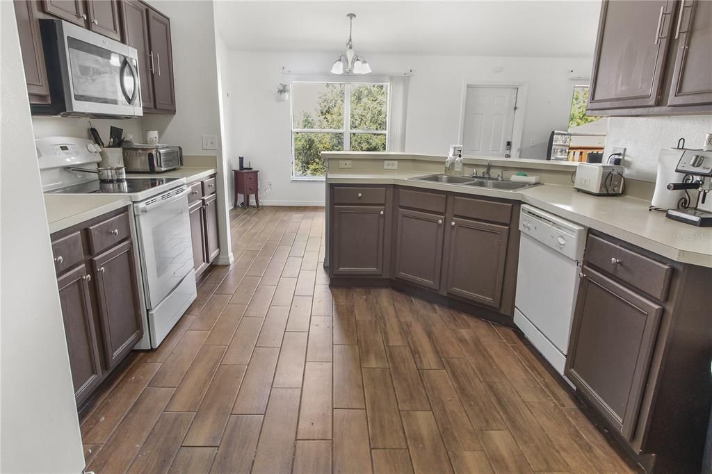 Chef's kitchen with ample storage and counterspace.