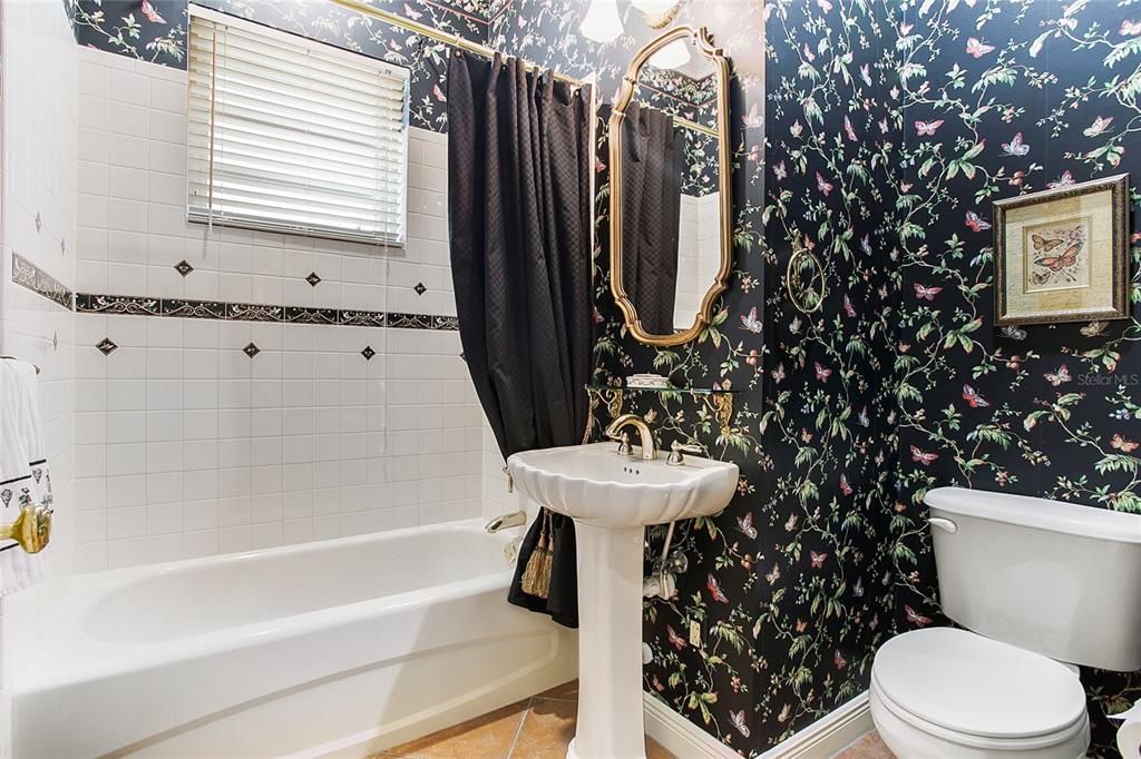 Full tub bath adjacent to downstairs guest room.