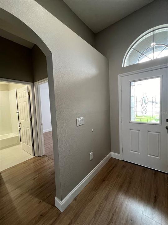 Main Entry and Hallway to Guest Bath and Guest bedroom