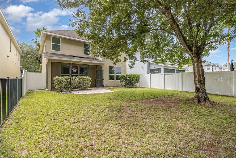 Large fenced yard on conservation lot.