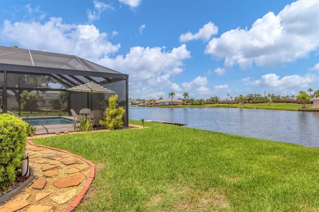 Beautiful Side Yard and Pool Cage