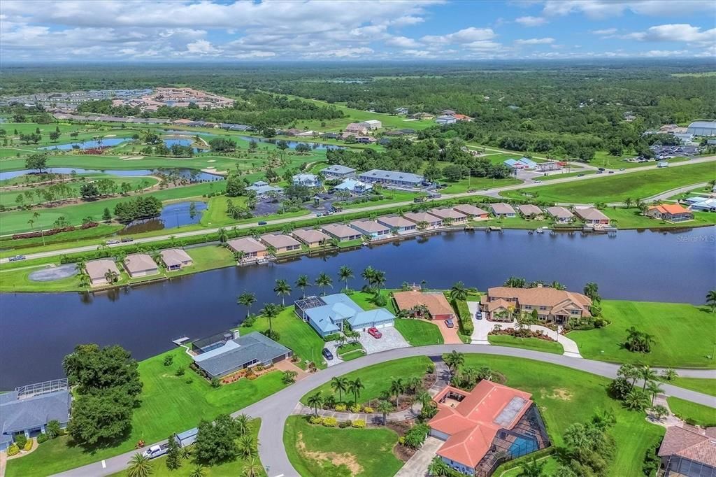 Home on the Left with Double Lot.