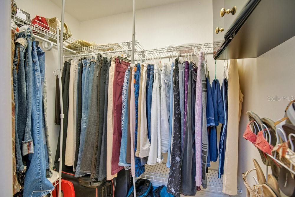 walk-in closet in owner's suite bathroom