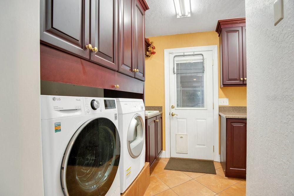 Laundry room with utility sink and washer & dryer INCLUDED