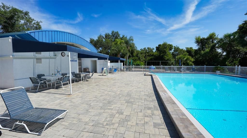 Mote Ranch's playground is located next to the pool