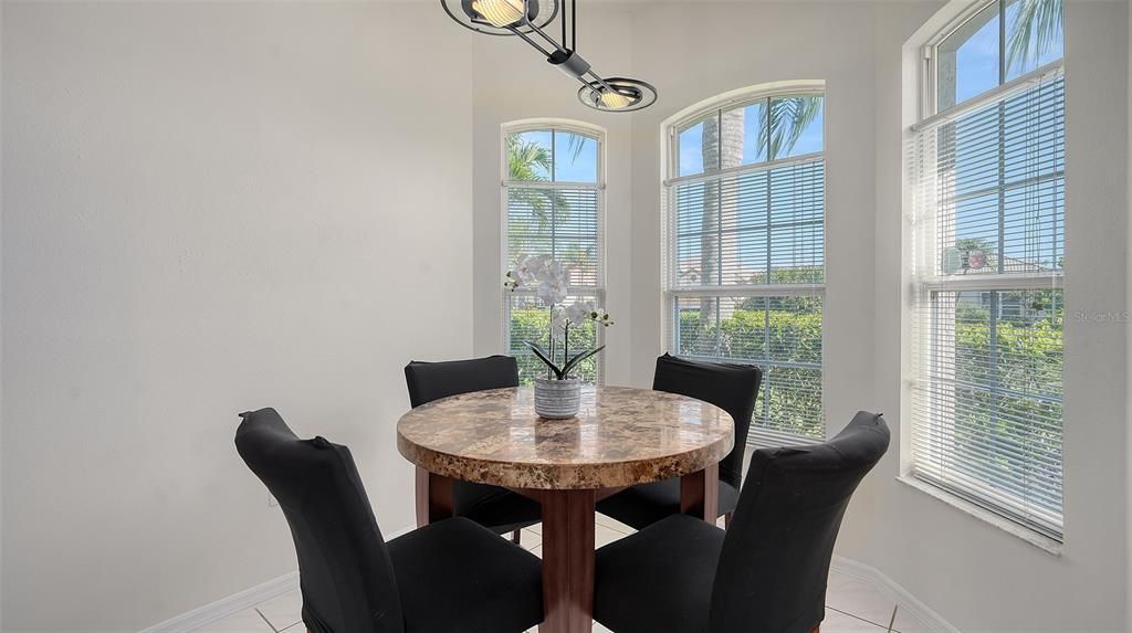 The convenient breakfast area with custom light fixture