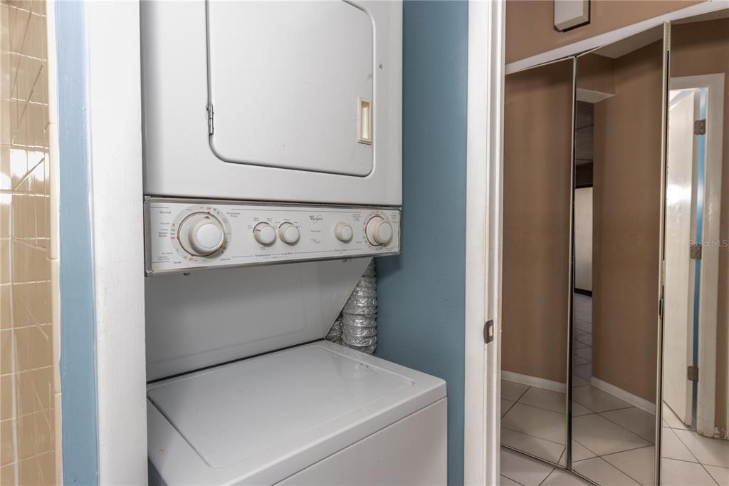 PRIMARY BATHROOM WITH WASHER/ DRYER STACKED