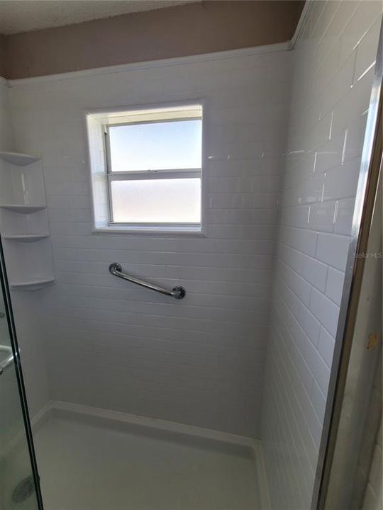 Newer shower surround