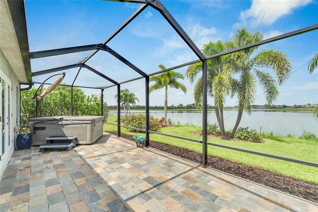 Screened in Lanai with gorgeous Pavers flooring, Jacuzzi, and that spectacular view!