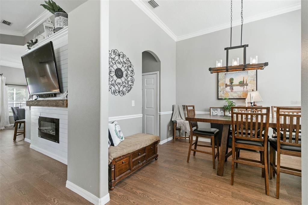 Bright airy dining room and open to kitchen.