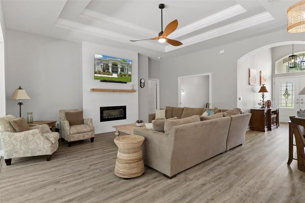 Great Room looking at foyer, Den, and Primary Bedroom Entry