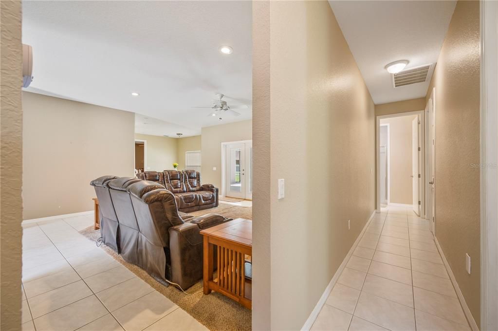 Hallway to spare bedrooms and bathrooms