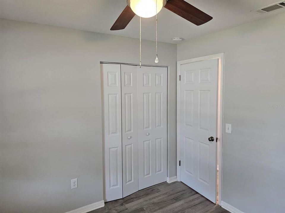 Front middle bedroom closet doors