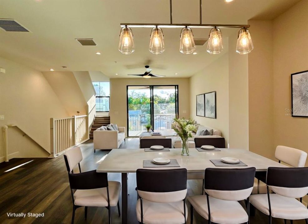 Dining Room Opens to the Living Room - Virtually Staged