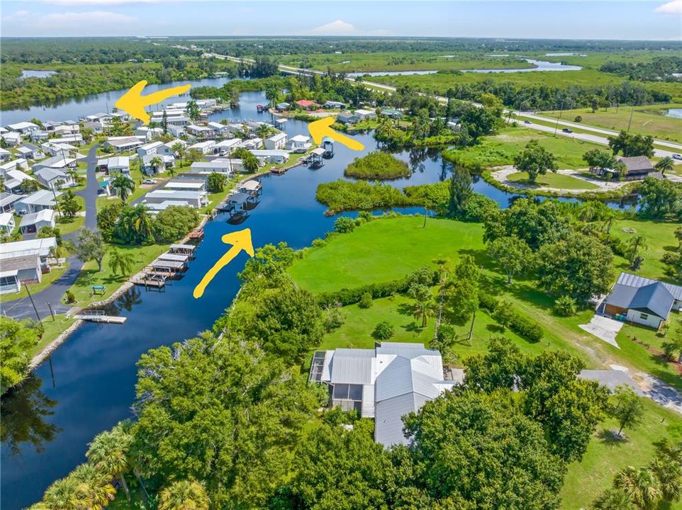 Mature landscaping graces this .88 acre waterfront lot.