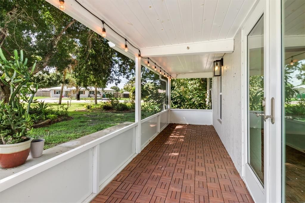 Screened front porch accessible from Dining/Kitchen area. Enjoy morning coffee and listen to nature!