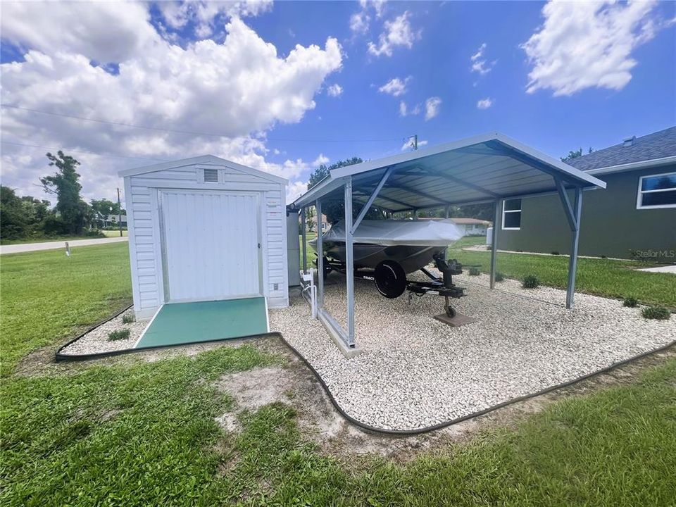 Storage Shed with Boat Carport