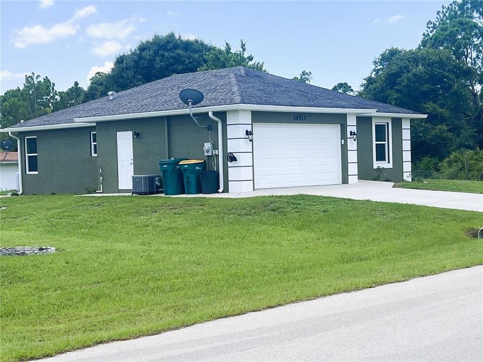 Front with 2 car garage