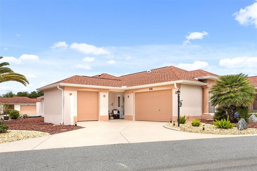 BOND PAID! GOLF CART GARAGE on a CORNER LOT! Welcome to this truly rare find in The Village of De La Mesa!