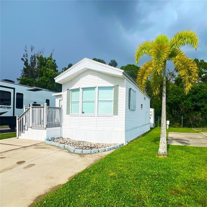 Front of home and driveway for two vehicles