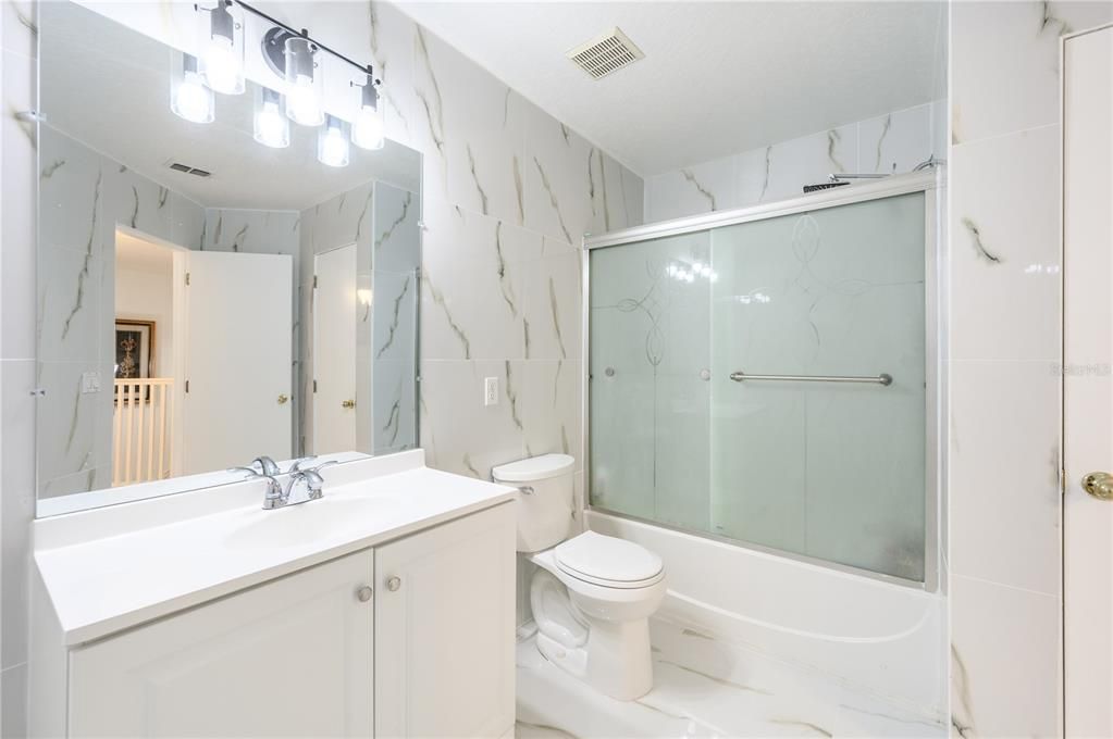 Updated upstairs beautiful Bath view of Shower and Tub bath.