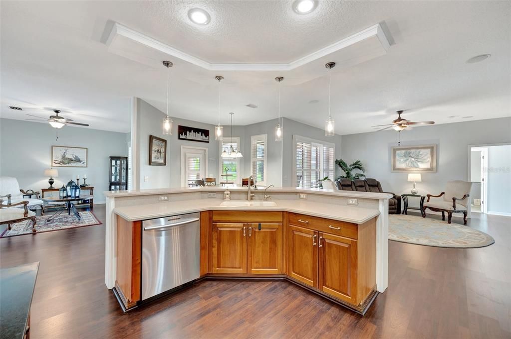 Center island with Corian counters and plenty of prep space