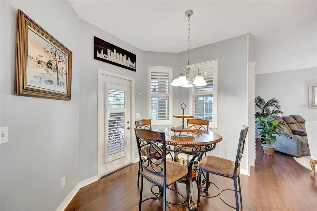 Breakfast nook with door to screened in patio