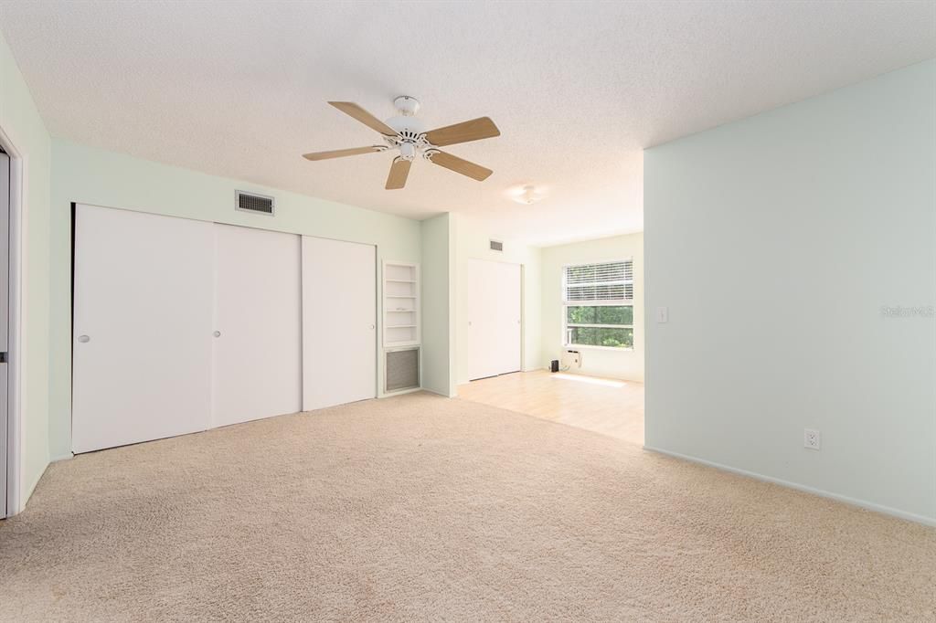 LARGE BEDROOM WITH VIEW OF SUNROOM