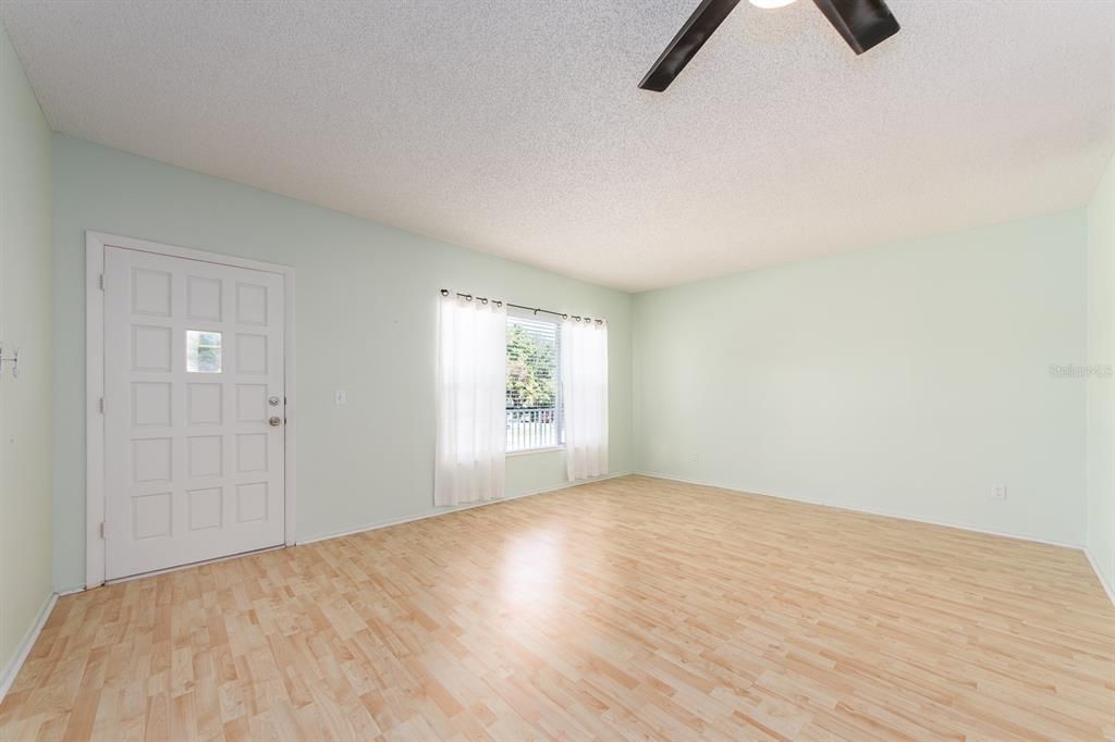 LIVING ROOM WITH UPDATED FLOORING