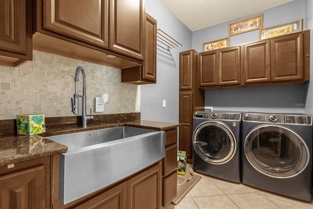 Laundry Room with Farm Sink- entry to 3 car tandum garage