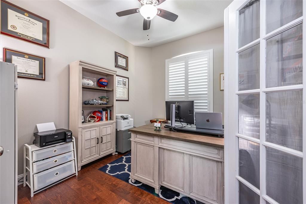 Private office is 10' x 11' with glass french doors just inside the font door to the right.