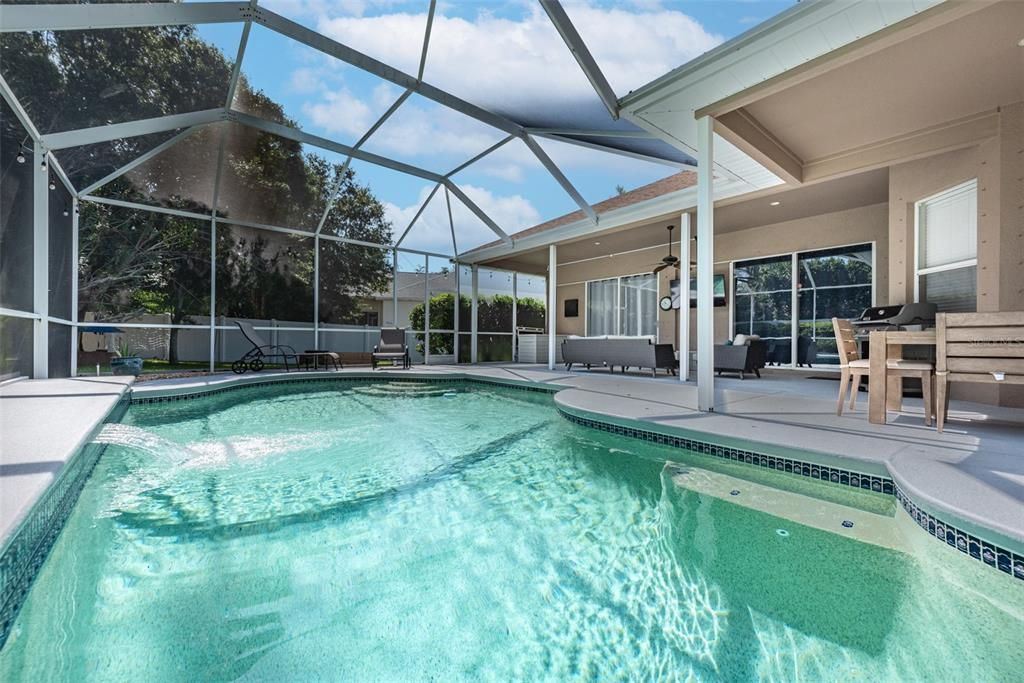 Enjoy the calming sound of the waterfall aerating the pool.