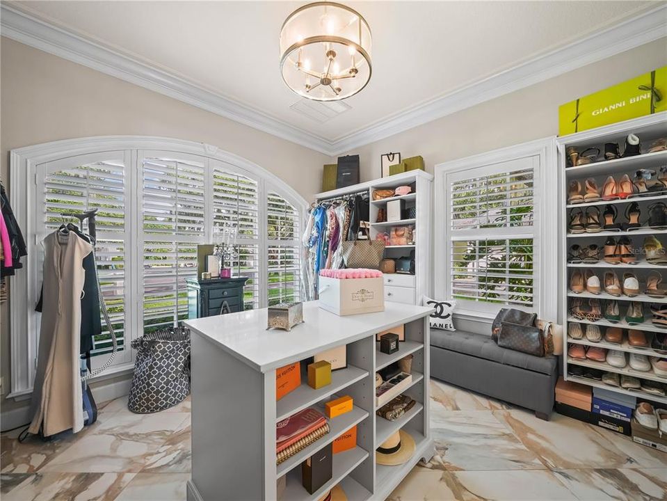 BONUS Third Primary walk in closet with island and dressing area